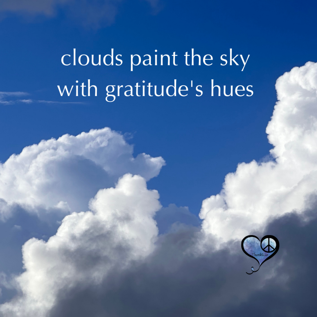 Photo of Clouds in the sky with quote "Clouds paint the sky with gratitude's hues."